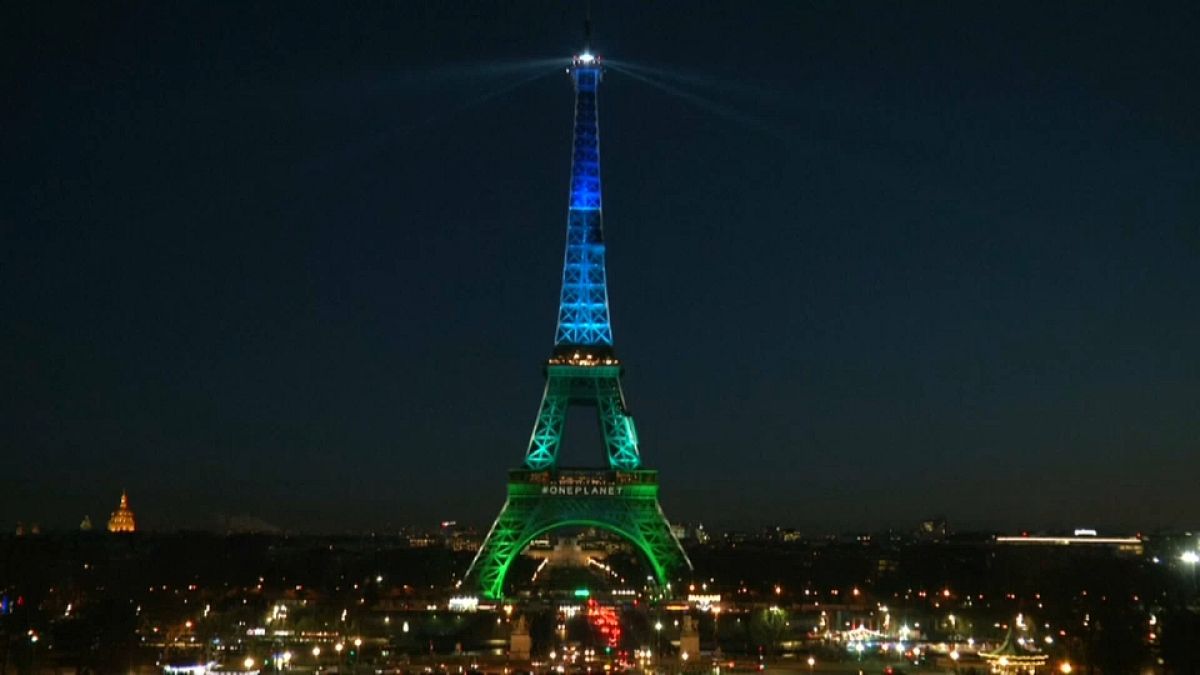 Eiffel Tower lit up with vegetable oil