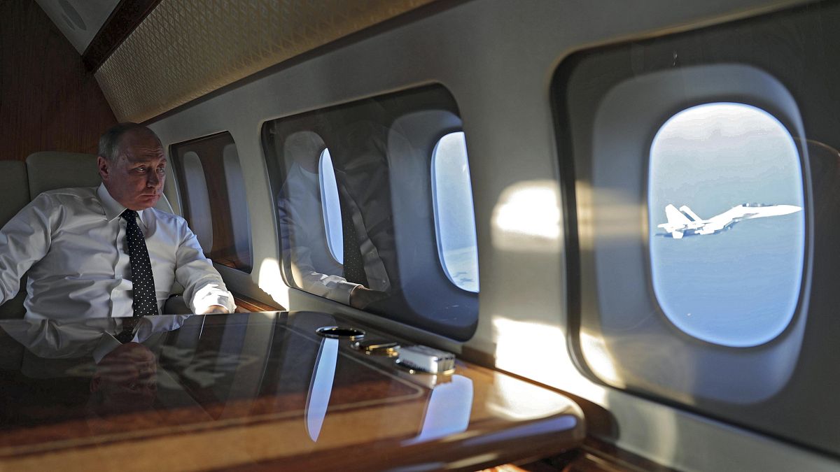 Vladimir Putin on board his presidential aircraft
