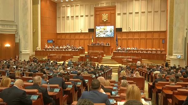 Romania's MPs approve controversial judicial reforms Romania's MPs approve controversial judicial reforms