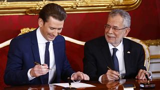 Austria's president swears in new coalition government