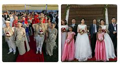 Couples pose for photographs during a mass wedding ceremony