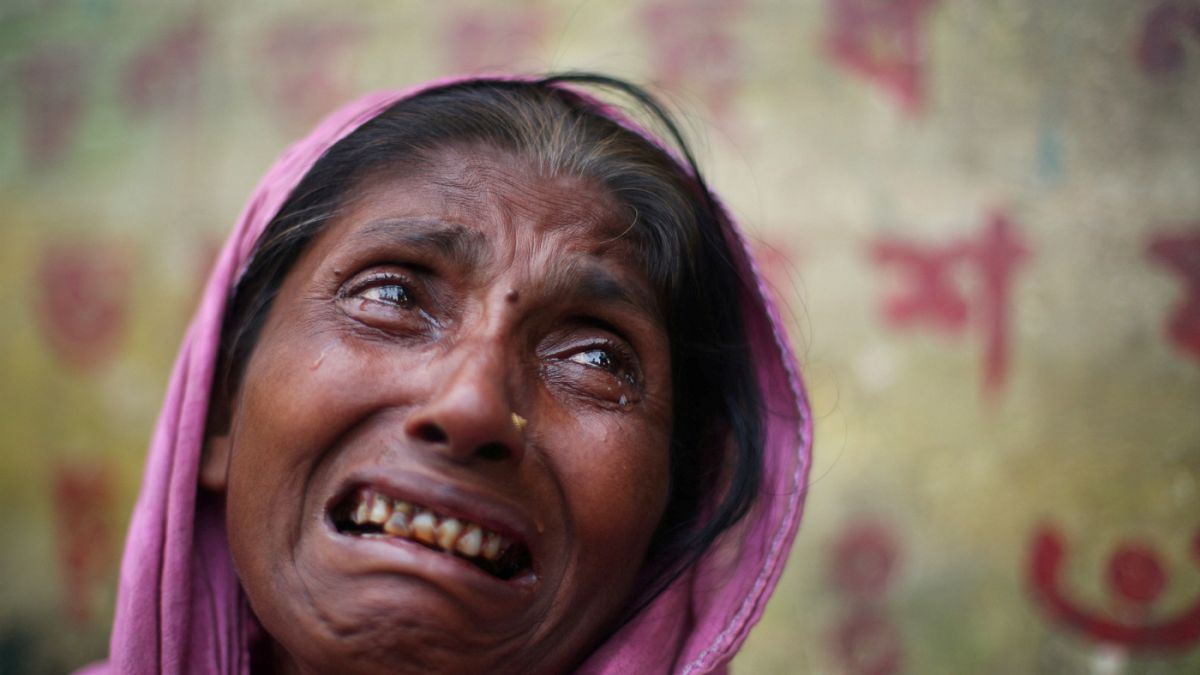 گریه یکی از زنان روهینگیا که از خشونت در میانمار گریخته است