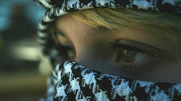 A Palestinian girl with a kaffiyeh A Palestinian girl with a kaffiyeh