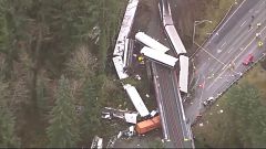 Investigators seek answers from crew of derailed Amtrak train