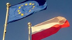 Flags of the European Union (upper left) and Poland (lower right)