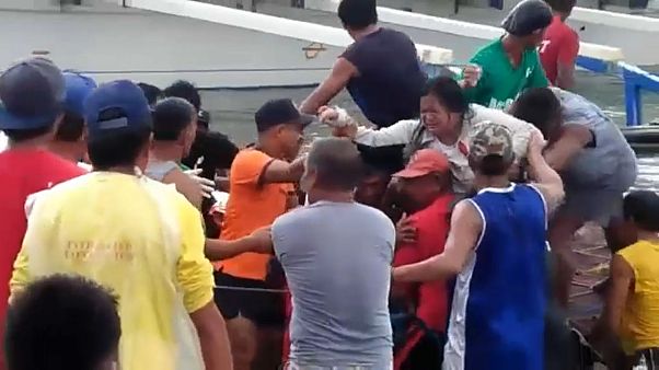 Philippine ferry carrying 250 passengers capsizes, many feared dead Philippine ferry carrying 250 passengers capsizes, many feared dead