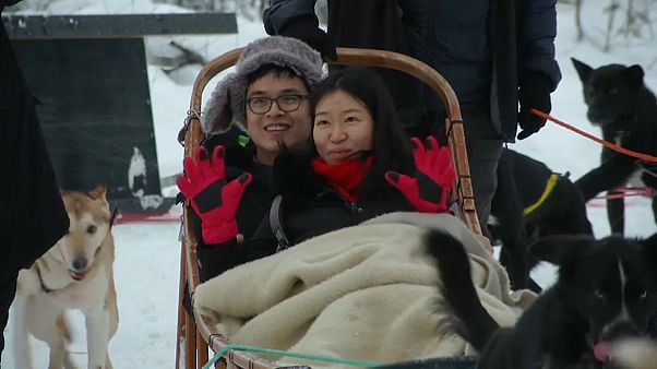 Asiatische Touristen begeistert von Lappland Asiatische Touristen begeistert von Lappland