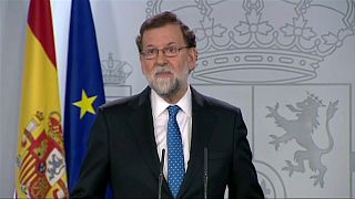 Spanish Prime Minister Mariano Rajoy speaks to the press