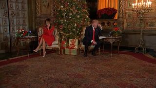 Melania and Donald Trump speak to children
