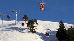 Skiers trapped in broken down gondolas in the French Alps are dramatically rescued