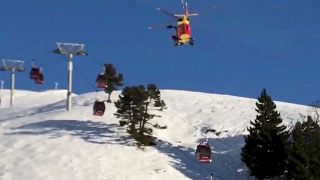 Skiers trapped in broken down gondolas in the French Alps are dramatically rescued