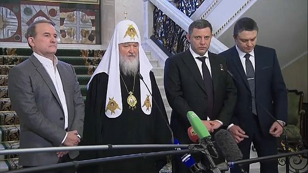 Viktor Medwedtschuk, Patriach Kirill und Vertreter der Separatisten Viktor Medwedtschuk, Patriach Kirill und Vertreter der Separatisten