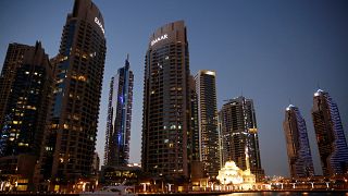 A tour boat is seen at the Dubai Marina in Dubai