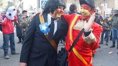 A reveller masked as former Catalonian President Carles Puigdemont