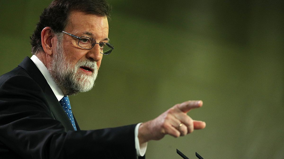Spain's Prime Minister Mariano Rajoy attends a press conference 