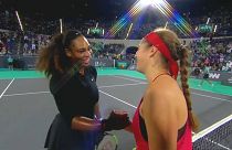 Serena Williams congratulates opponent