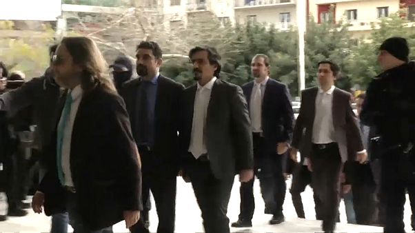 Archive footage of the eight soldiers arriving in court Archive footage of the eight soldiers arriving in court