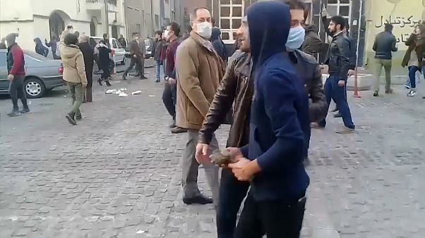 Protesters threw stones in clashes with riot police Protesters threw stones in clashes with riot police