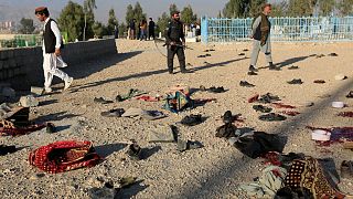 Belongings of blast victims lie on the ground on the outskirts of Jalalabad