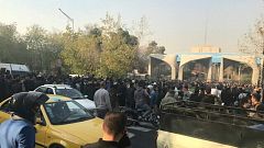 People protest near the university of Tehran
