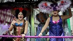 Performers wave to the crowd during the New Year's Day parade in London