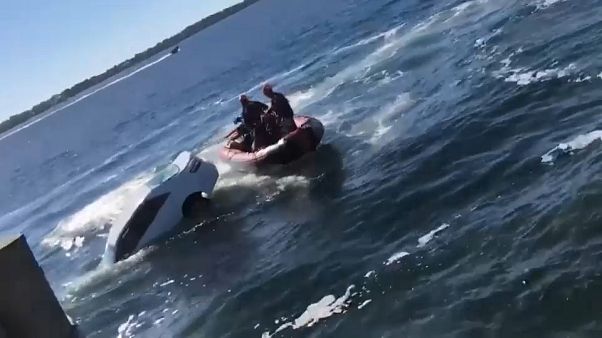 Floride : le retraité, sa voiture et la baie de St-Andrews Floride : le retraité, sa voiture et la baie de St-Andrews