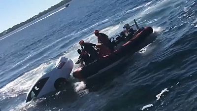 Man rescued from sinking car