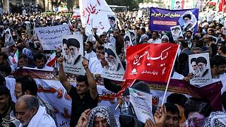 People take part in pro-government rallies, Iran