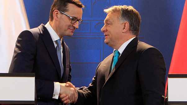 Ματέους Μοραβιέτσκι και Βίκτορ Όρμπαν Ματέους Μοραβιέτσκι και Βίκτορ Όρμπαν