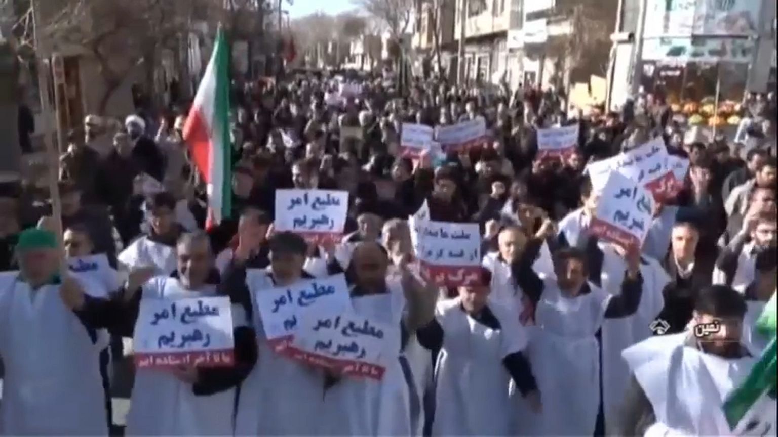 Groups march in support of Iran's regime 