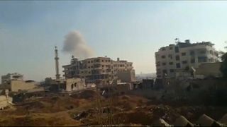 Syrian troops break rebel siege near Damascus