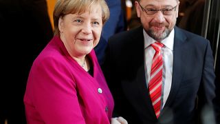 Germany's Merkel battles for political survival in 'last-ditch' talks with SPD