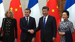 Macron appeals to China over climate change and boosting ties