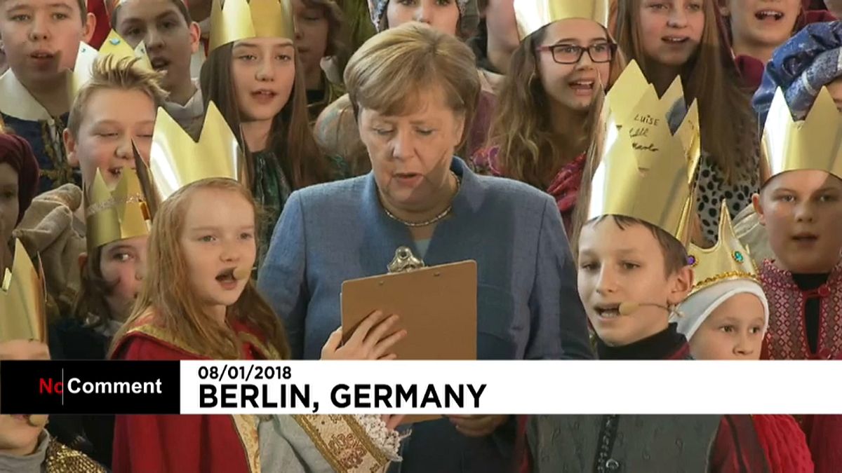 Меркель приняла участие в песнопениях по случаю Богоявления