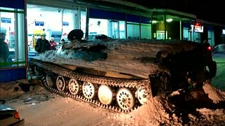Russian man rams stolen armoured personnel carrier into shop, steals wine