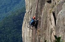 Lai Chi-wai climbing Hong Kong's Lion Rock