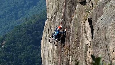 Lai Chi-wai climbing Hong Kong's Lion Rock