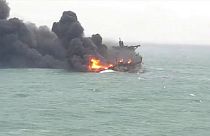 Families' anguish as Iran tanker burns