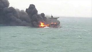 Families' anguish as Iran tanker burns