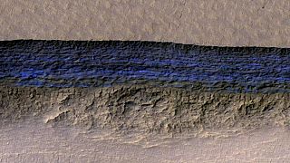 A cross-section of Mars' underground ice shown in blue on this NASA image