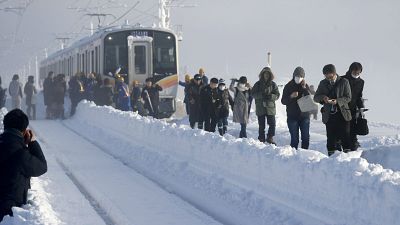 Heavy snow strands 430 people overnight on train in Japan