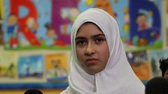 Khawlah Noman speaks to reporters at Pauline Johnson Junior Public School