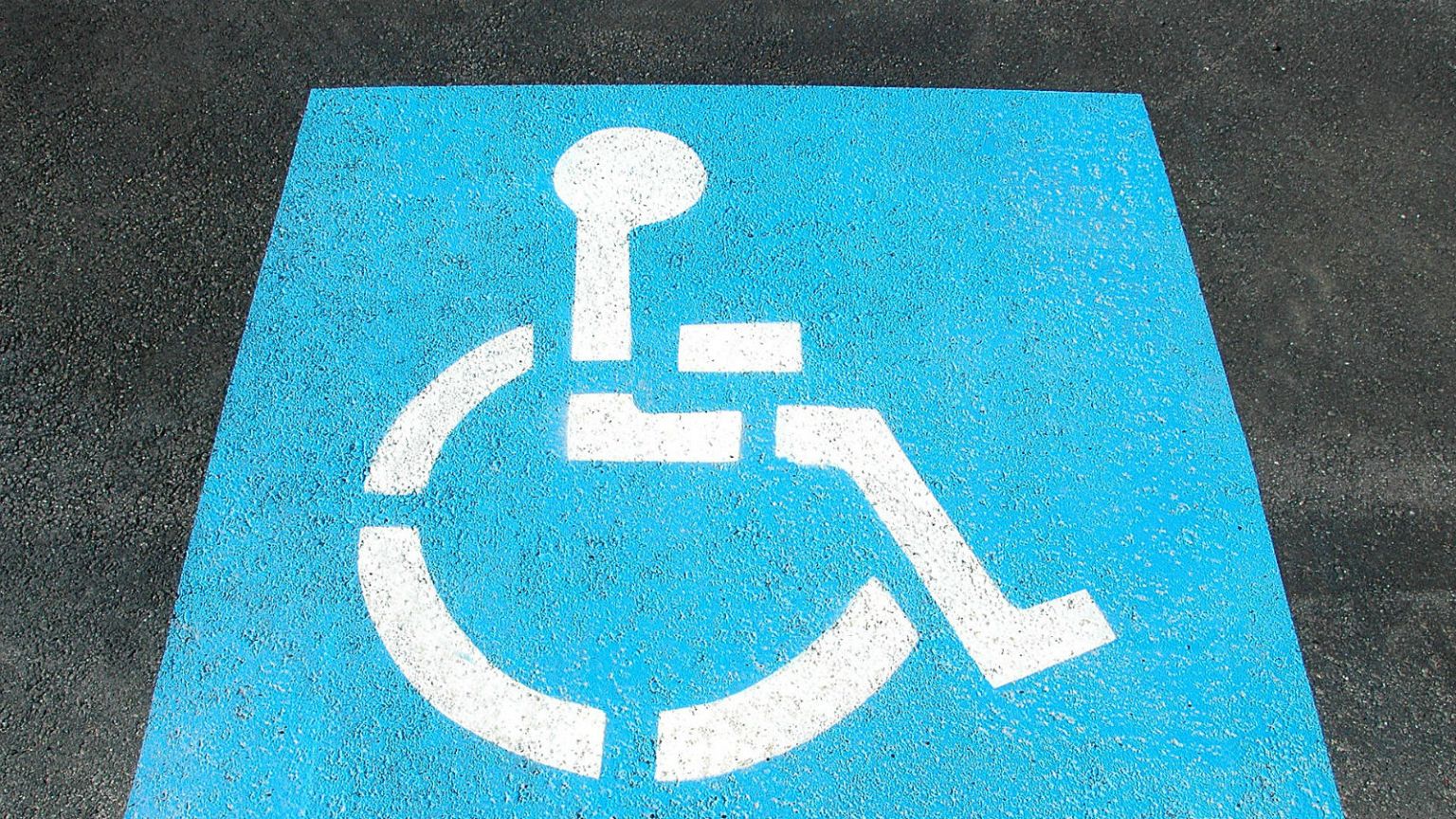 Texas city trains volunteers to catch drivers who park in disabled spaces