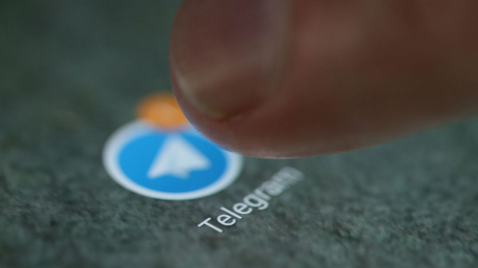The Telegram app logo is seen on a smartphone in this picture illustration