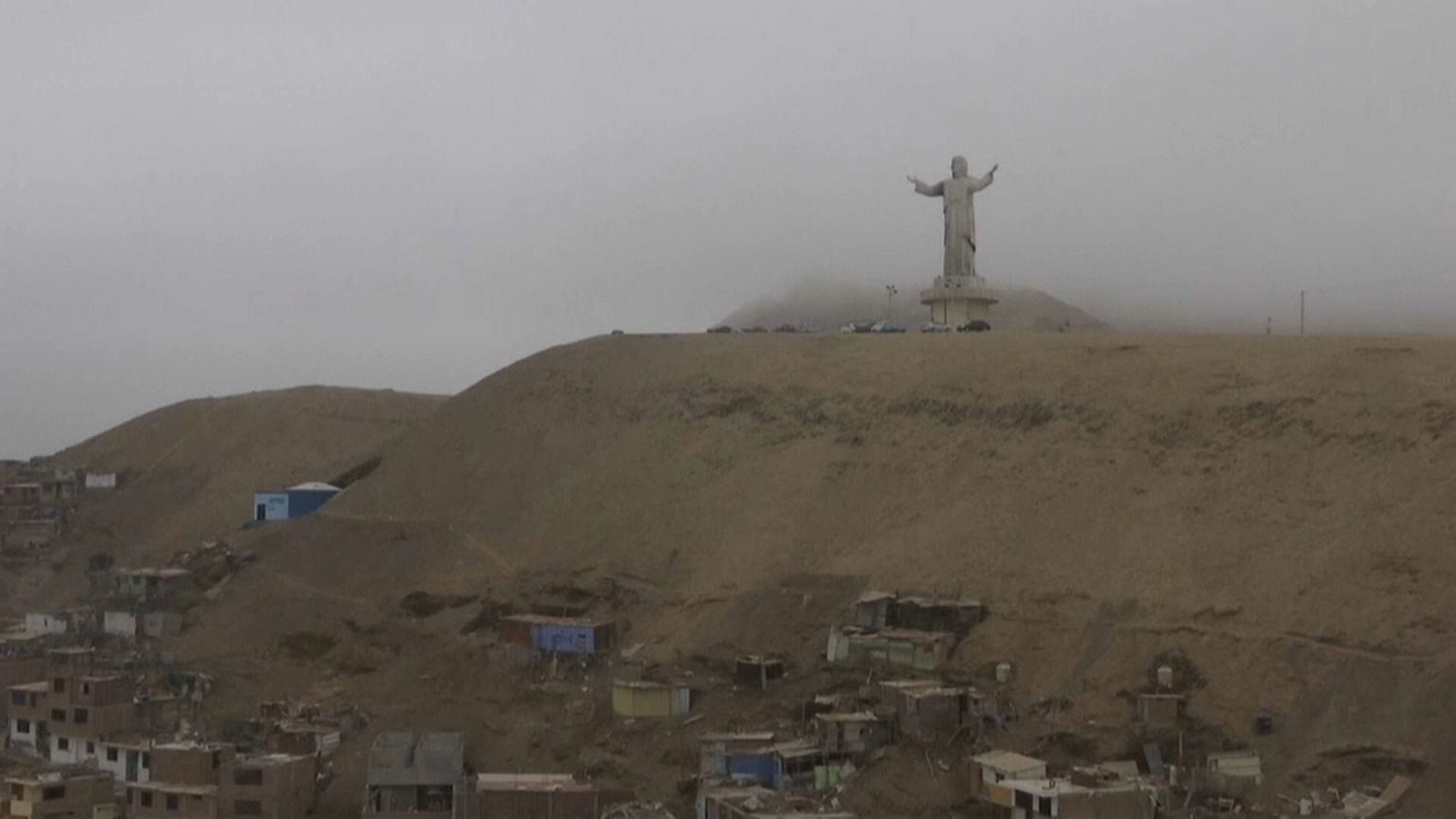 Christ burns in Lima as Peru's anti-corruption protesters wait on Pope's words