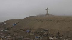 Christ burns in Lima as Peru's anti-corruption protesters wait on Pope's words
