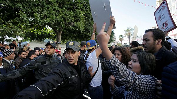 Tunisia Police and people react during demo the 7th anniversary Tunisia Police and people react during demo the 7th anniversary