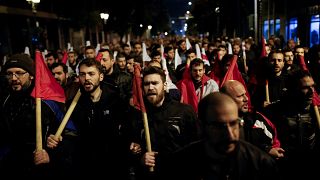 Protests and clashes in Athens as parliament passes more reforms