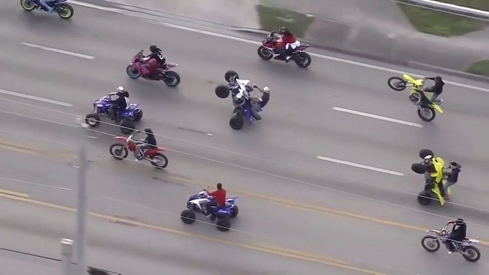 VIDEO 'Wheels Up, Guns Down' ride through Miami Euronews