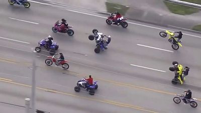 'Wheels Up, Guns Down' ride through Miami